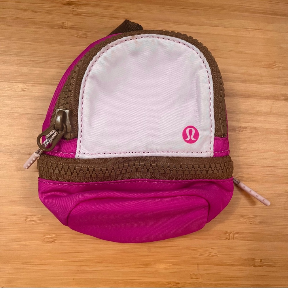 NWOT Lululemon City Adventurer Nano Backpack Bag Charm Sonic Pink Brown
